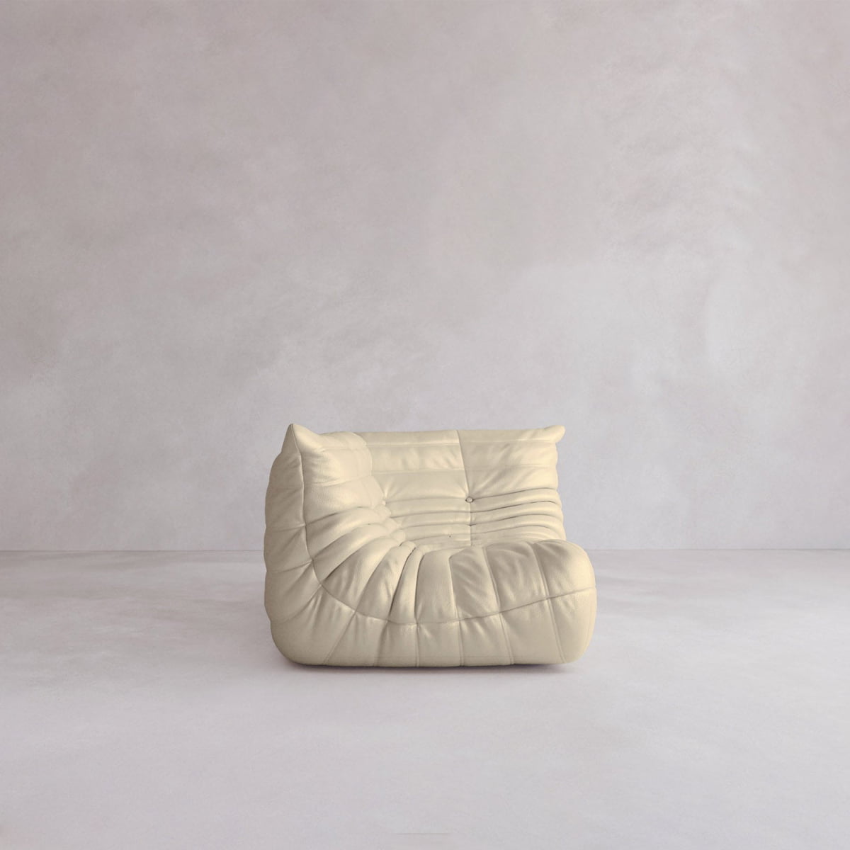 The Rolo Lounge Corner Sofa features a cream color, modern low-profile 70s-inspired design with soft, tufted, and slightly wrinkled upholstery on a light, minimalist background.