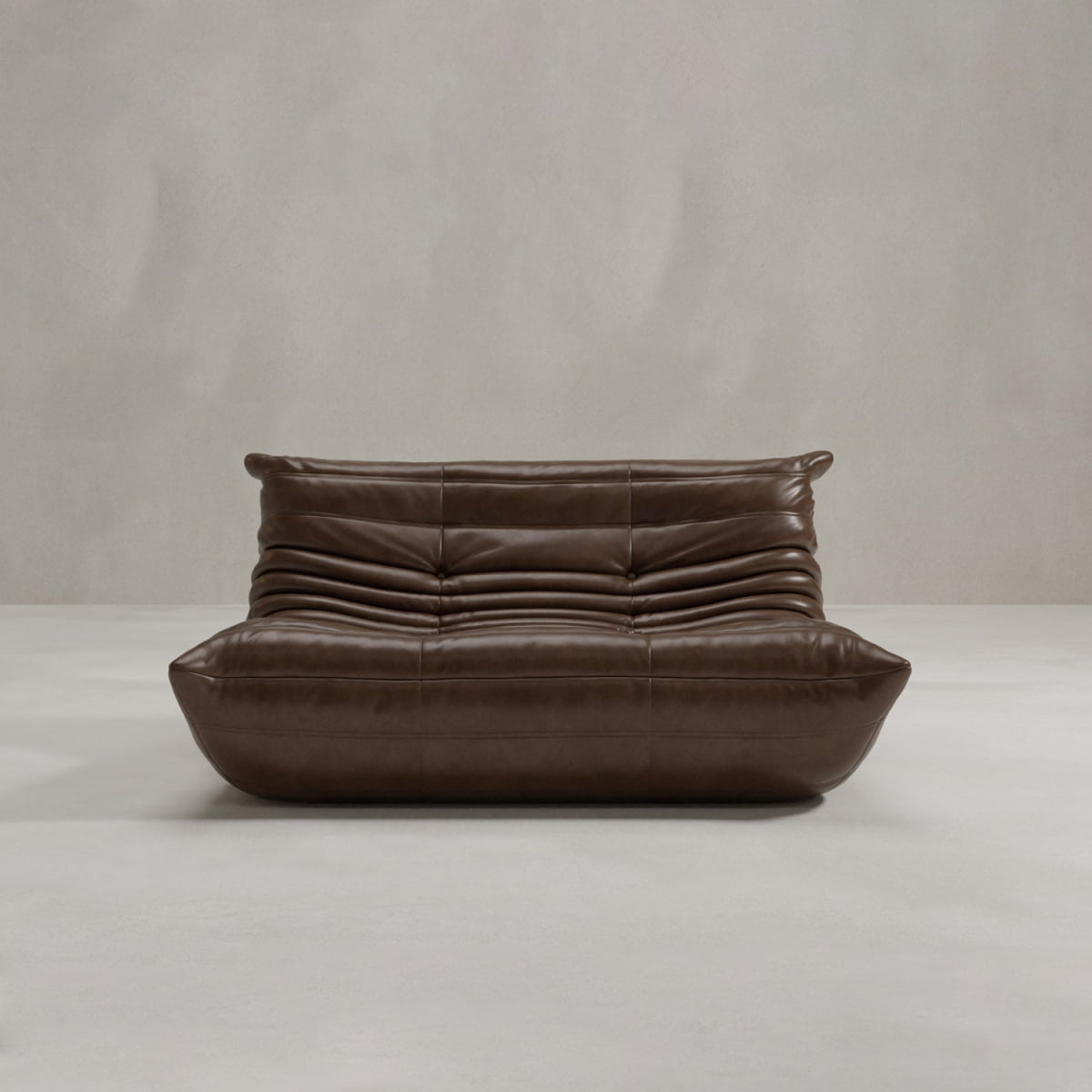 The Rolo Lounge Loveseat features modern brown leather upholstery, soft rounded edges, and horizontal pleats on the backrest for a mid-century vibe, shown here against a plain light gray background.