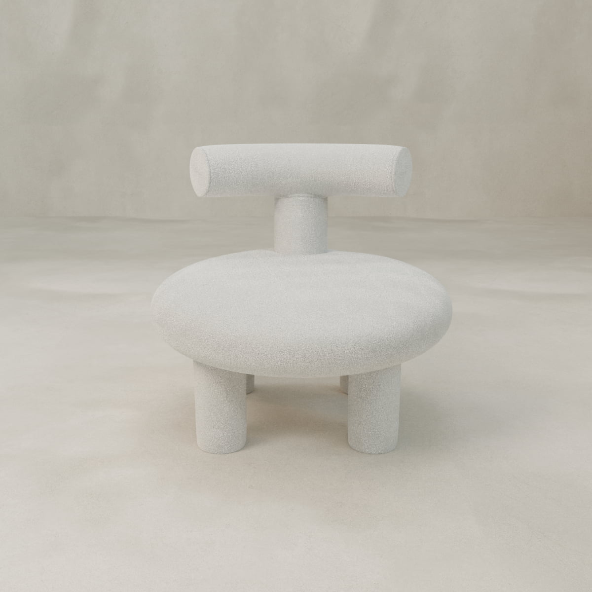 The Teddy Chair features a modern, minimalist design with a round seat, cylindrical backrest, and four thick legs—all in textured light gray fabric—creating a luxurious statement piece for any space.